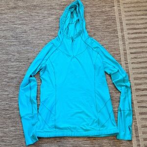 Blue Hooded Pullover. It’s the color in the 3rd pick . Like new and so soft